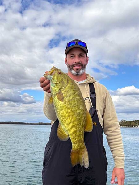 Man with big smallmouth bass 480img1599