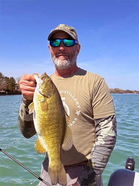 Man with a smallmouth bass 480img0887