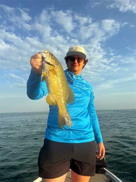 Man with smallmouth bass 480img1353