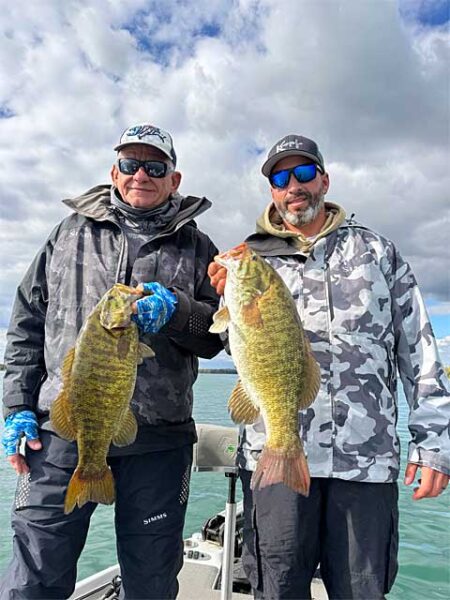 Two anglers with 2 smallmouth bass img1601